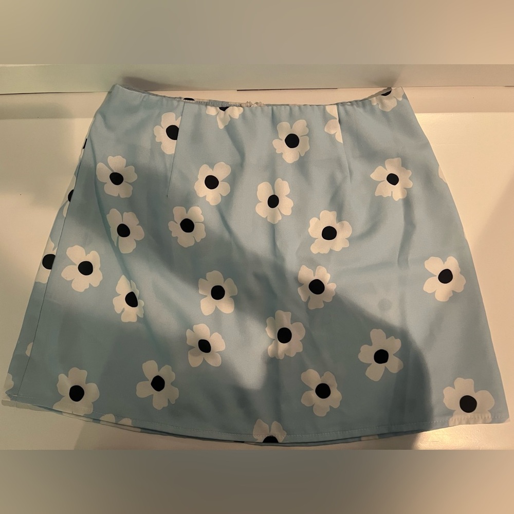Light Blue Mini Skirt With White Flowers